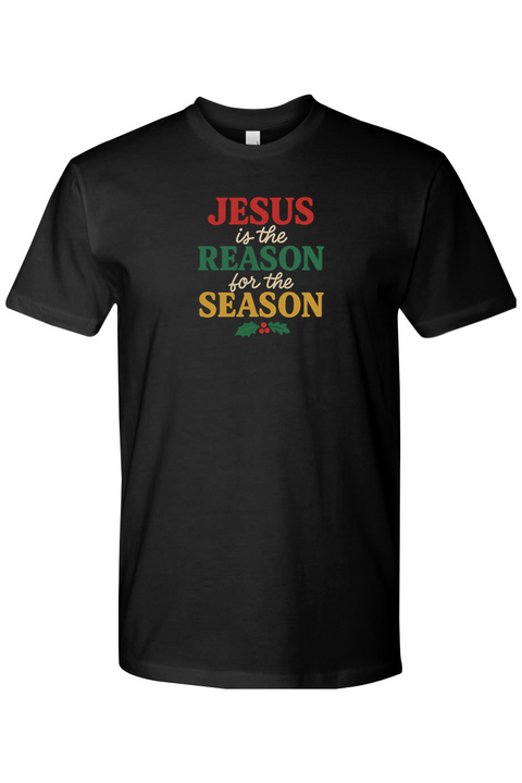 Black t-shirt with 'Jesus is the Reason for the Season' text in red, green, and yellow color and a holly design underneath. Jesus Christian Christmas T-Shirt Short Sleeve.
