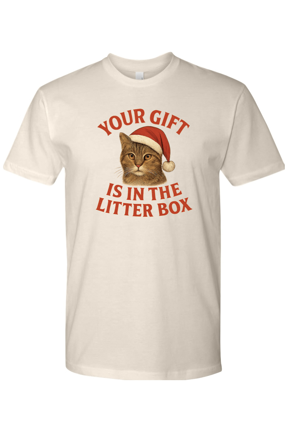Cream Christmas t-shirt with "Your Gift is in the Litter Box" text in red with a cat wearing a Santa hat design funny sarcastic holiday humor short sleeve shirt