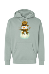Light green Christmas hoodie with a snowman in a leopard print bow and leopard print top hat design cute girly festive holiday long sleeve hooded sweatshirt