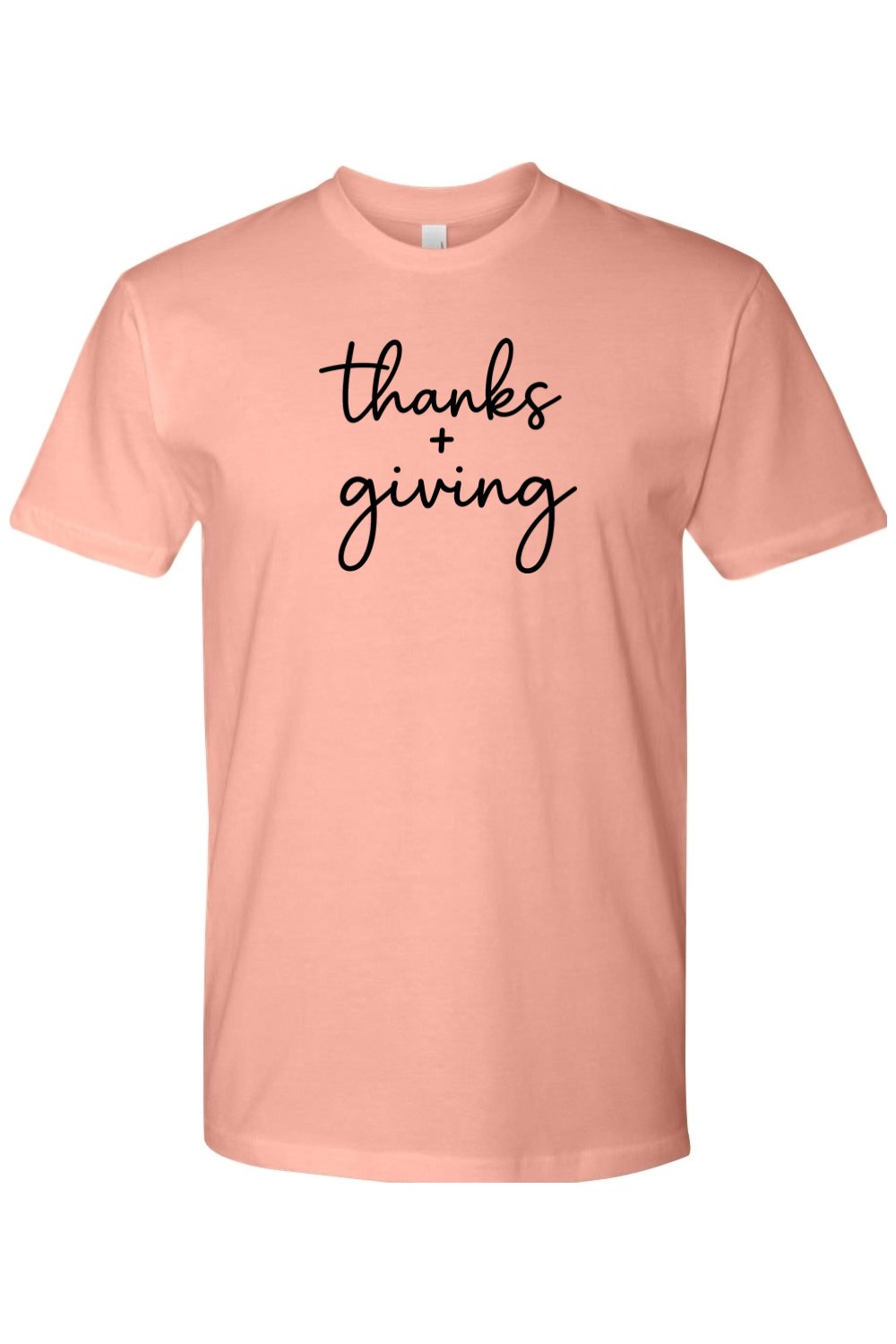 Pink Thanksgiving t-shirt with "thanks + giving" text in black cute trendy fall holiday short sleeve shirt