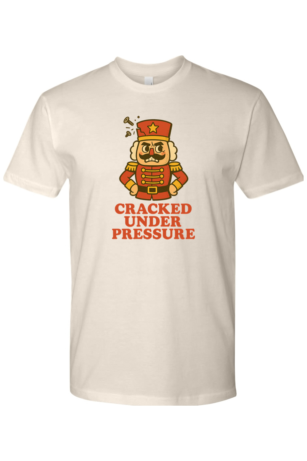 Beige vintage Christmas t-shirt with "Cracked Under Pressure" text and a cracking nutcracker design funny sarcastic retro holiday short sleeve shirt