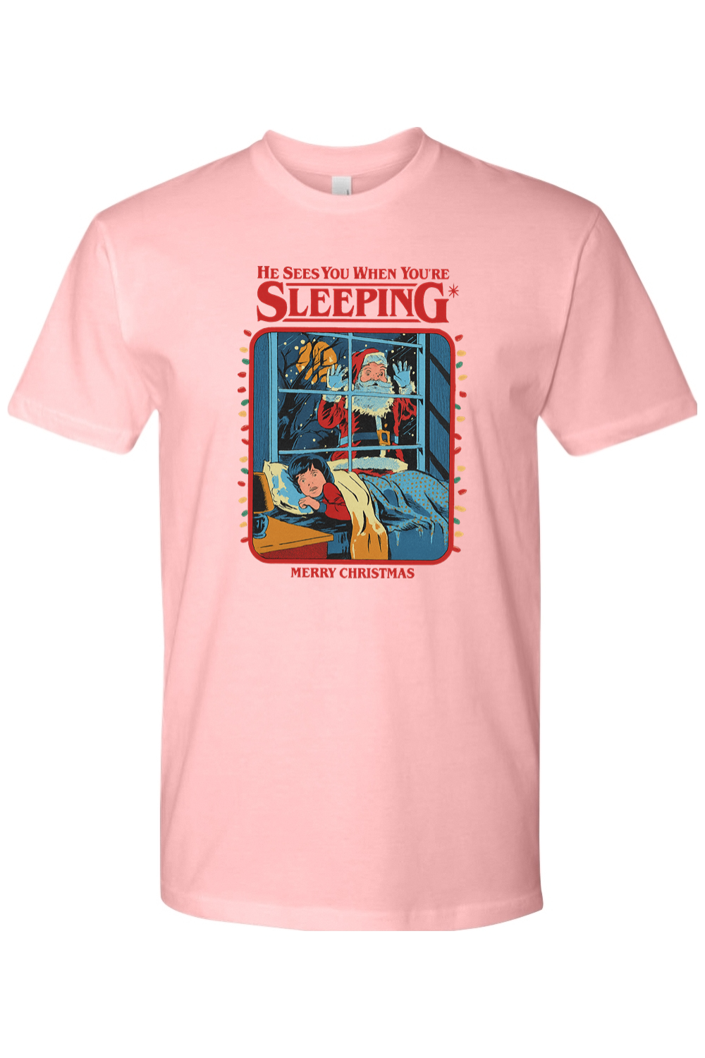 Light pink Christmas t-shirt with "He Sees You When You're Sleeping. Merry Christmas" text with Santa peaking through a window design funny sarcastic holiday humor short sleeve shirt