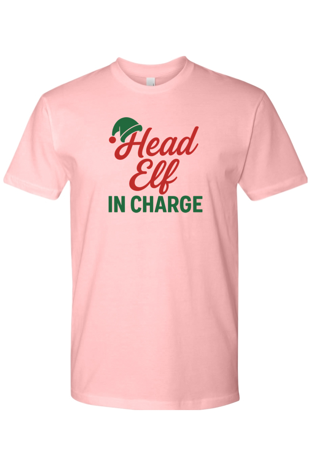 Light pink Christmas t-shirt with "Head Elf in Charge" text with an elf hat sitting on top of the H funny sarcastic holiday humor short sleeve shirt