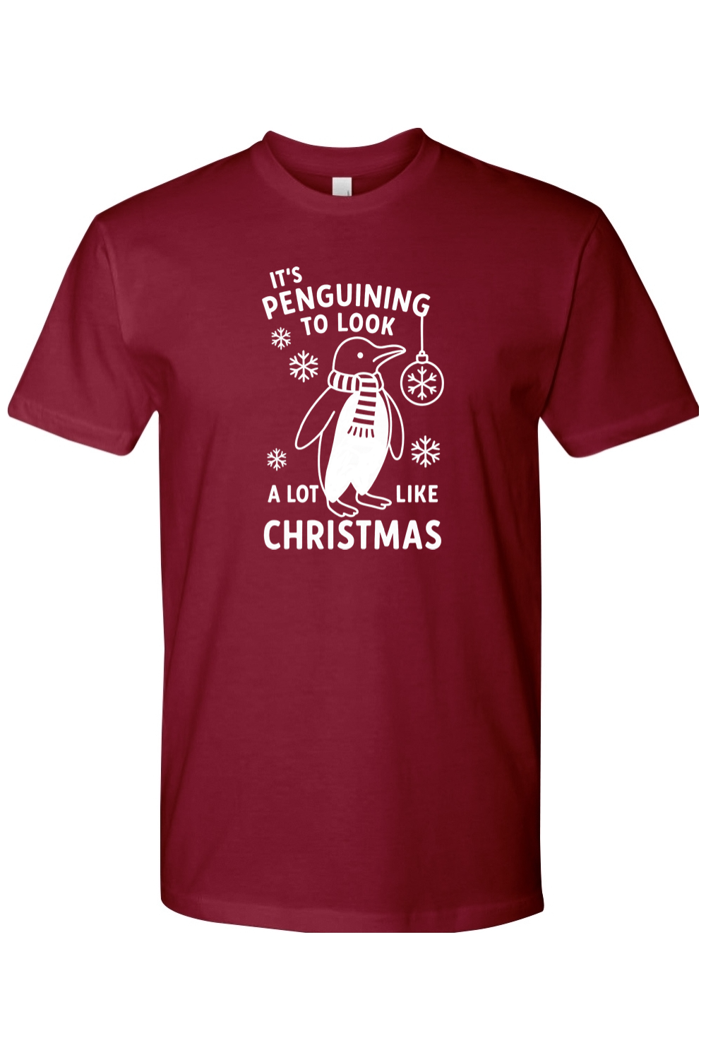 Burgundy penguin snowflake ornament Christmas design t-shirt with text It's Penguining to Look A Lot Like Christmas funny cute holiday short sleeve shirt