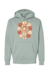 Light green Christmas hoodie with a poinsettia nutcracker wreath design trendy cute holiday long sleeve hooded sweatshirt