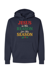 Navy blue Christmas hoodie with 'Jesus is the Reason for the Season' text in red, green, and yellow color and a holly design underneath Jesus Christian holiday long sleeve hooded sweatshirt