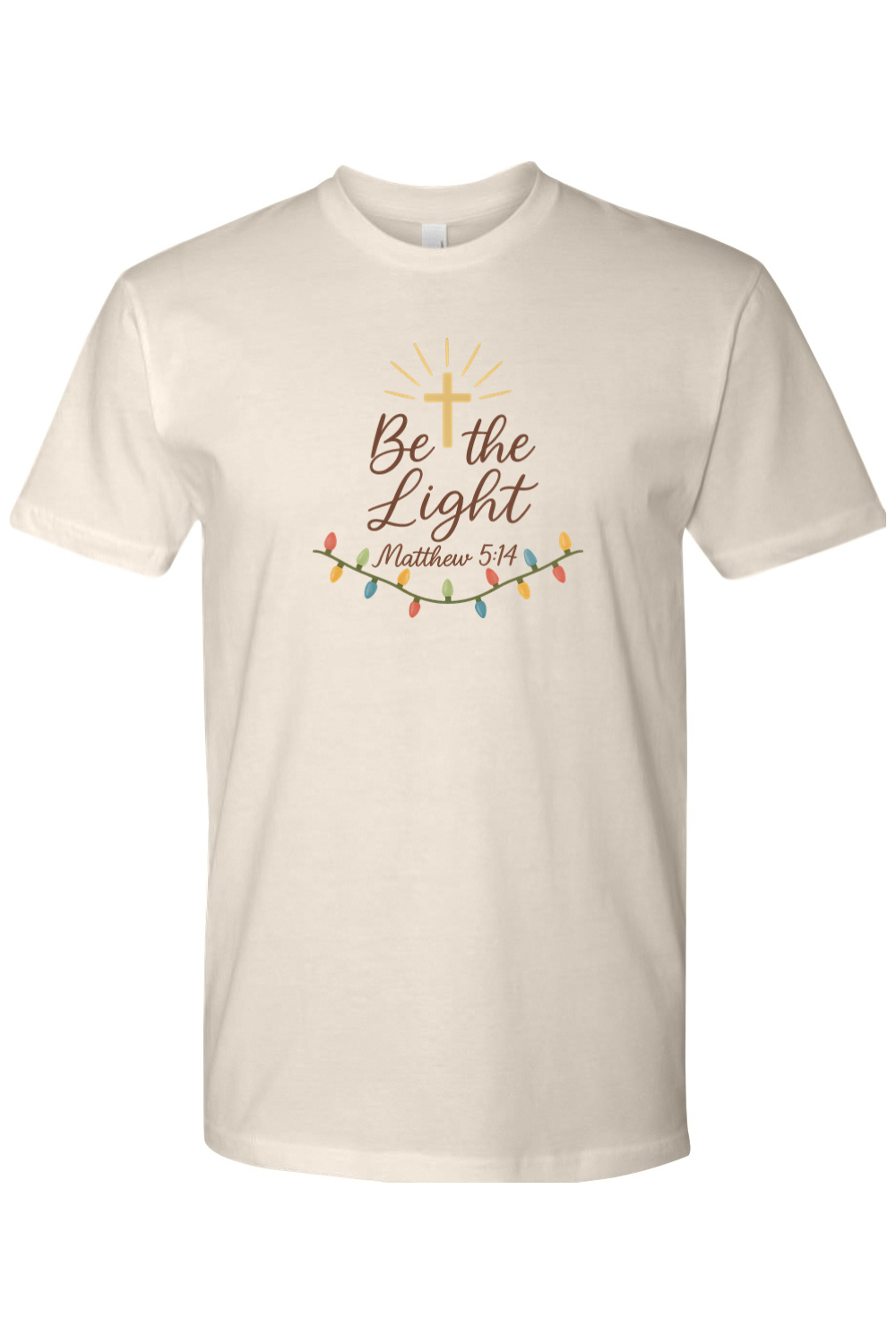 Beige cream Christmas t-shirt with "Be the Light Matthew 5:14" text and a cross Christmas lights design cute trendy religious God Jesus Christian holiday short sleeve shirt